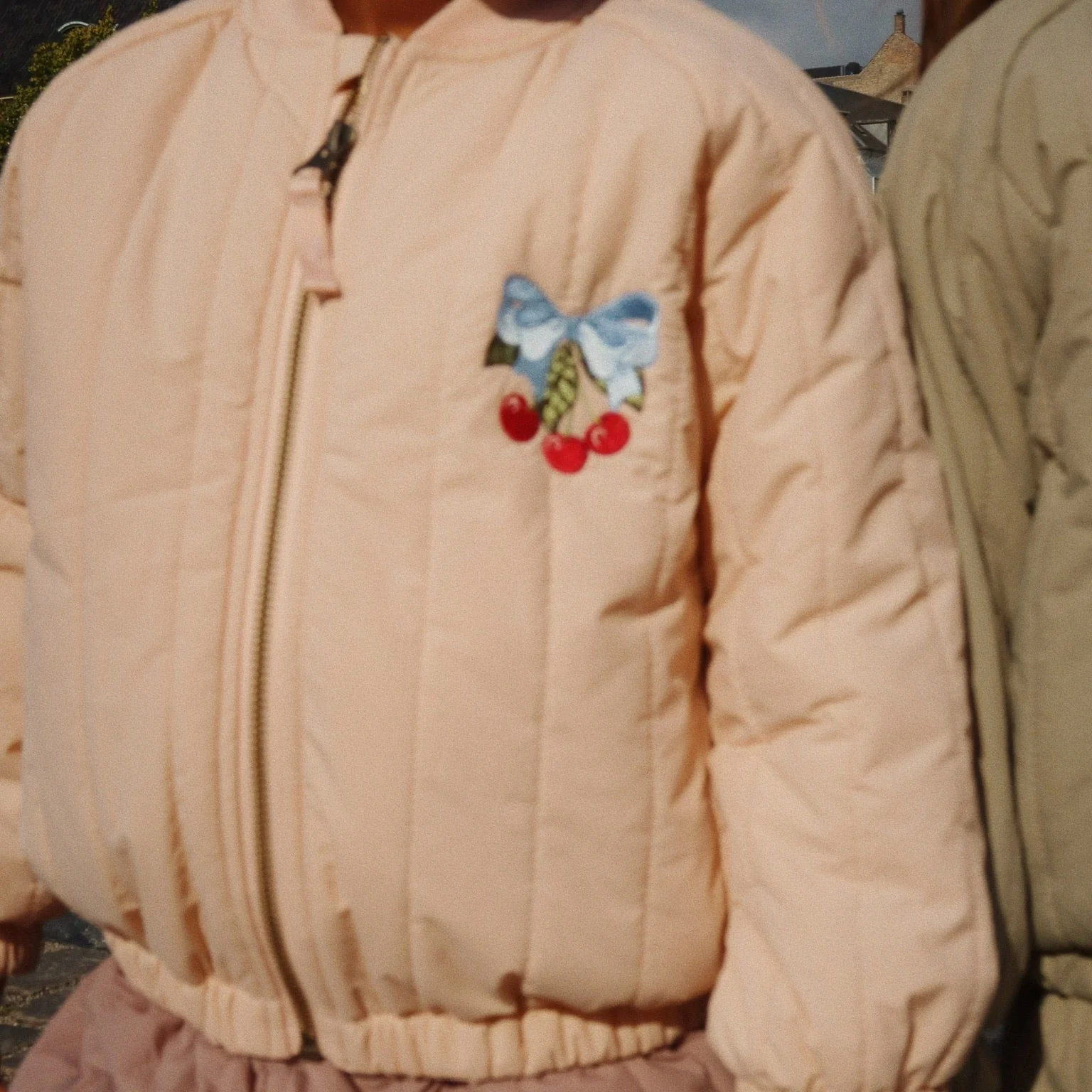 Juno Cherry Print Quilted Bomber Jacket (Cameo Rose)